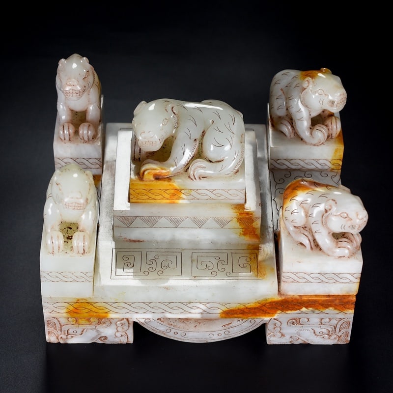 Formerly owned, a set of exquisite Hetian white jade Five Tiger Seals.: Formerly owned, a set of exquisite Hetian white jade five tiger seals. The jade is fine-grained, with a thick patina and deep, penetrating color. The carving is meticulous, and the condition is perfec