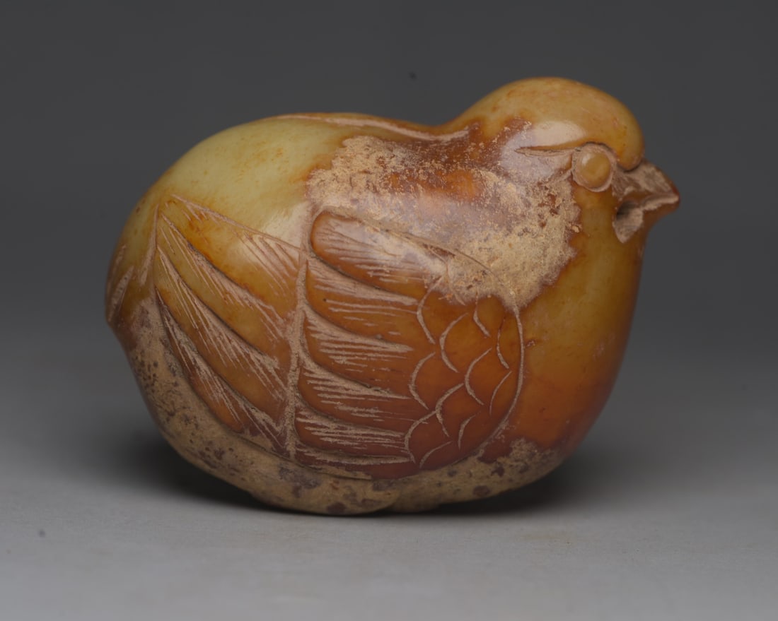 Hotan Jade Bird: Jade bird from Hetian: 7.1 x 5.7 x 4.6 cm, weighing 251 g. Provenance:Private collection, Liverpool, The United Kingdom. We warmly invite collectors, colleagues, and friends to join us for our auction