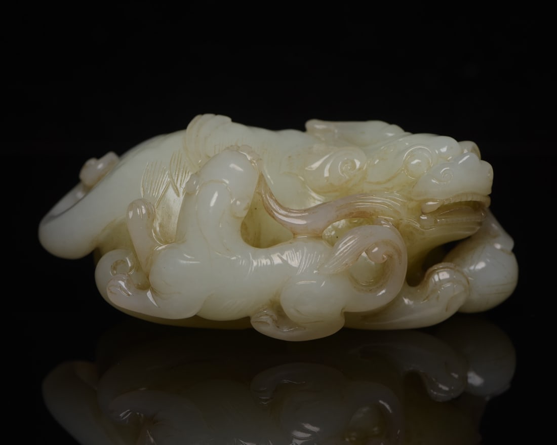 Hetian Jade Lion Cub: Hetian jade lion and cub design: 9.7 x 5.6 x 3.6 cm, weight 281 g. Provenance:Private collection, Liverpool, The United Kingdom. We warmly invite collectors, colleagues, and friends to join us for our