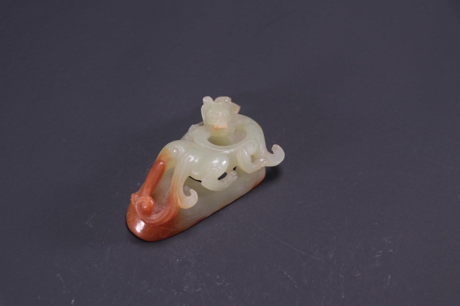 Formerly in the collection, Hetian jade heart-shaped pendant with dragon design: Formerly in the collection, this Hetian jade heart-shaped pendant with dragon design measures 7cm in length, 4.3cm in width, and 2.5cm in thickness, weighing 48g. Provenance:Private collection, Liverp