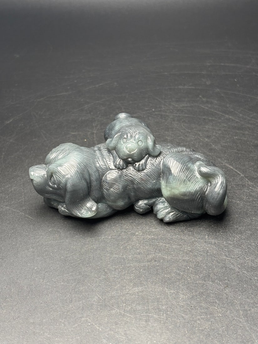 Exquisite Hetian jade father and son hand-held piece: Exquisite Hetian jade father and son hand-held piece symbolizing prosperity for the family, people, and career. Beautifully carved with a warm, lustrous jade texture. Dimensions: 84 x 47 x 39 mm. Weig
