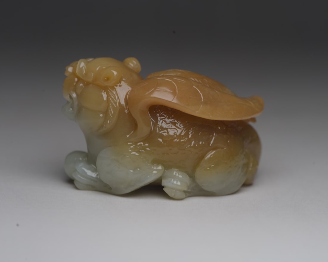 Hotan Jade Beast: Jade beast from Hetian: 5.3 x 3.3 x 2.6 cm, weighing 62 g. Provenance:Private collection from a professor in The University of Edinburgh. We warmly invite collectors, colleagues, and friends to join u