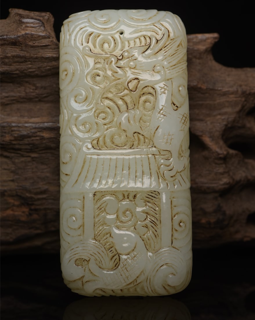 Hotan jade pendant: Hetian jade pendant dimensions: 9.1 x 4.1 x 1.8 cm, weight 168 g. Provenance:Private collection, Manchester, The United Kingdom. We warmly invite collectors, colleagues, and friends to join us for our