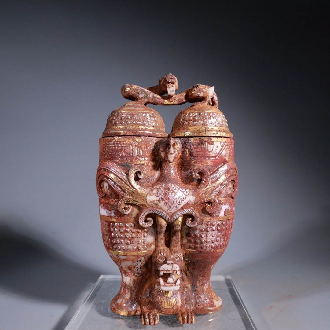 A Warring States and Han Dynasty white jade gilt-bronze round-carved double-lid censer featuring a (1 of 9)