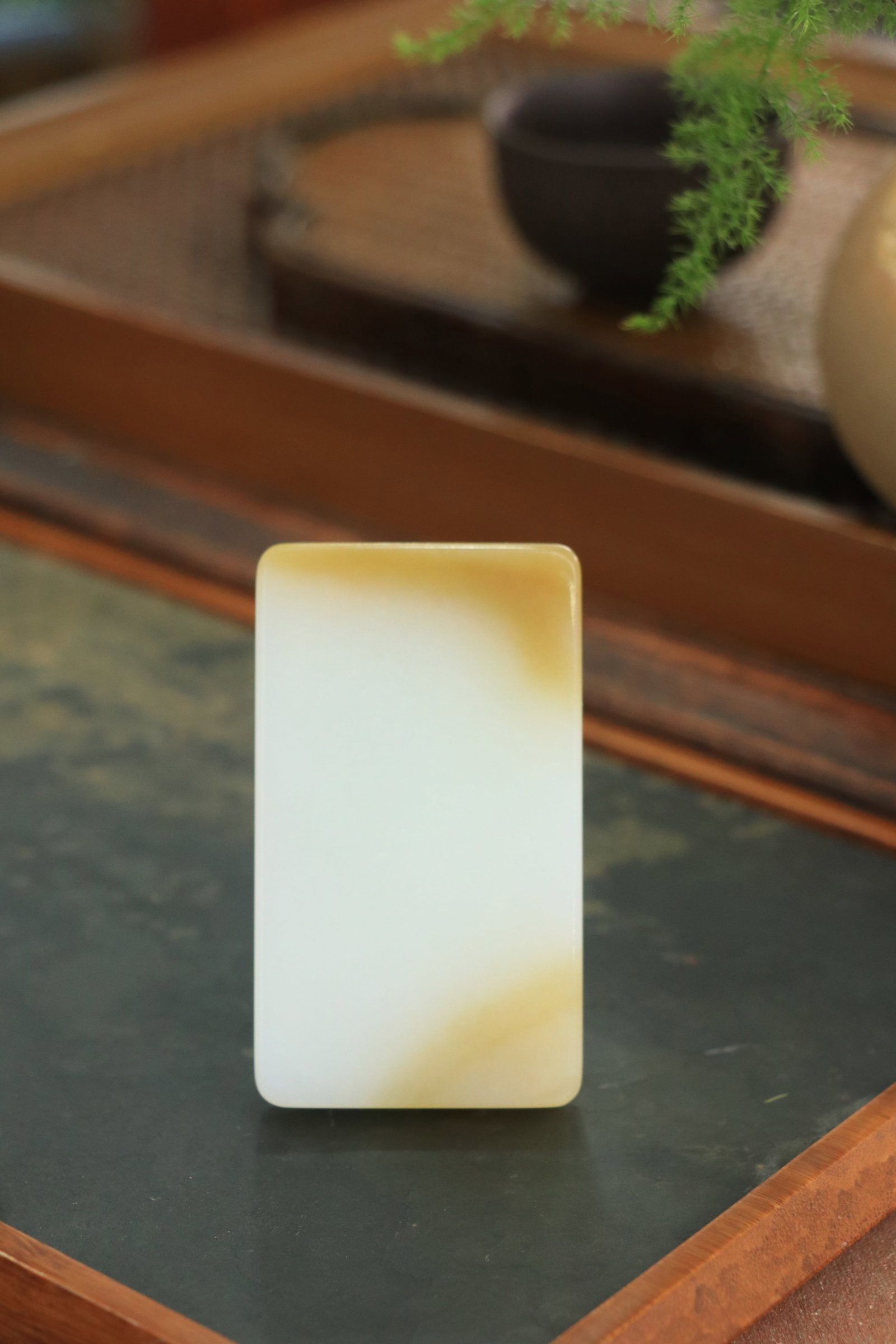 Ping An brand Hetian jade sugar white: This peace-themed Hetian jade pendant features a warm and delicate texture, with a well-proportioned square and round shape. Its simple and elegant design exudes a classic charm. The name signifies tr