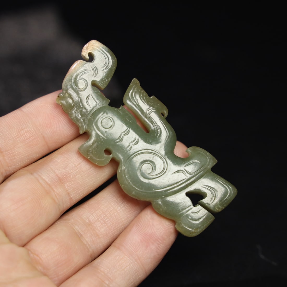 Former Collection of Hetian Jade Bird Pendant: This is a formerly owned Hetian jade pendant depicting a mythical bird. The jade is fine and lustrous, with a well-developed patina. Details are shown in the picture. It measures 7.2cm in length, 3.2c