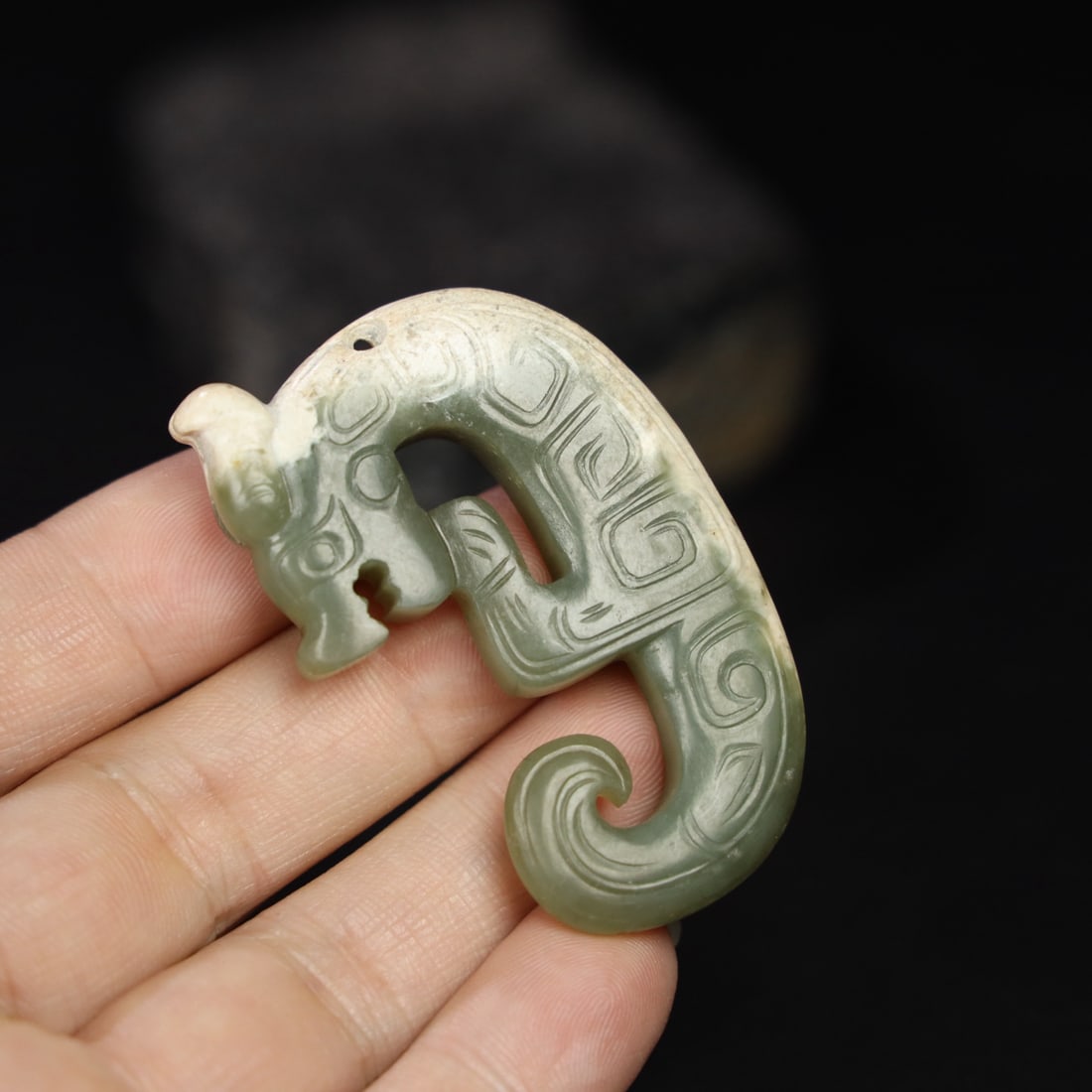 Former Collection of Hetian Jade Dragon Pendant: This is a formerly owned Hetian jade dragon pendant. The jade is fine and lustrous, with a well-developed patina. Details are shown in the pictures. Dimensions: 5.8cm long, 3.8cm wide, 1cm thick, and 