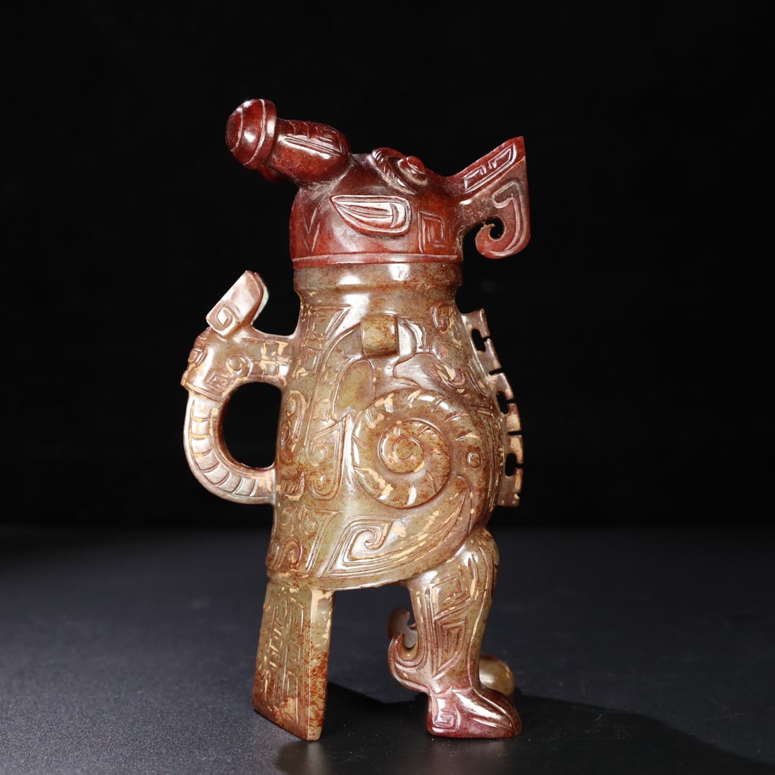 Former Collection of Hetian Jade Bottle: The old Hetian jade bottle has a delicate and oily texture and a well-developed patina. It measures 11cm in length, 7.5cm in width, 19.5cm in height, and weighs 1099g. Provenance:Private collection fr