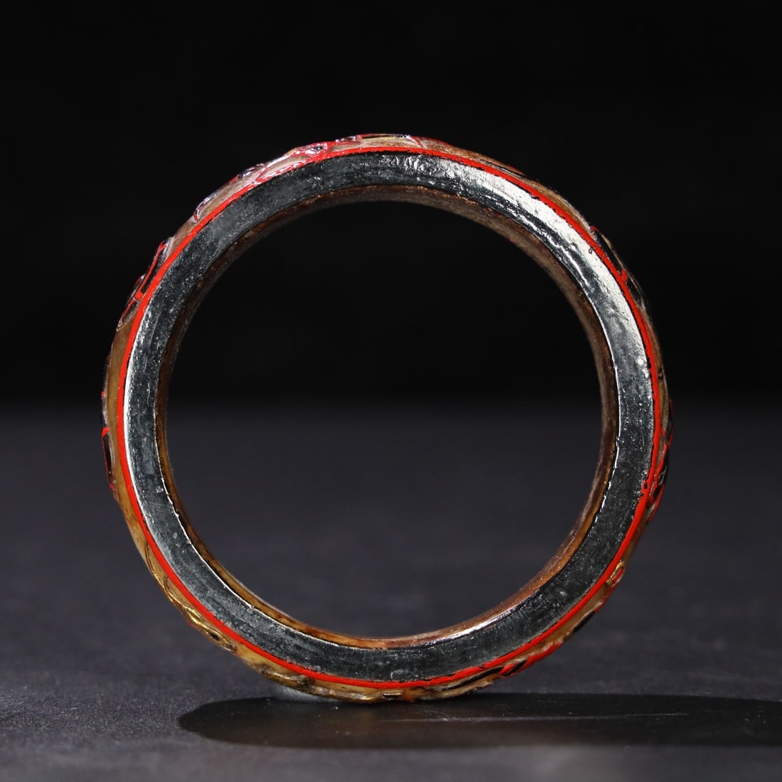 Former Collection of Hetian Jade Gilded and Painted Bangle: This is a formerly owned Hetian jade bangle with gold-painted details. The jade is delicate and lustrous with a well-developed patina. Details are shown in the pictures. Dimensions: 61mm in diameter, 