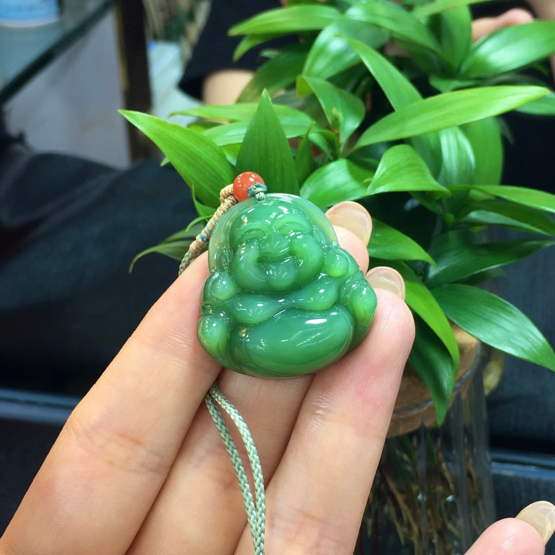 Jade Buddha: (Name) Jade Buddha (Description) Hetian jade Buddha pendant, beautiful color, fine texture, lustrous sheen, excellent value for money. Dimensions: 30 x 29.5 x 11 cm, 15.5g Provenance:from the collecti