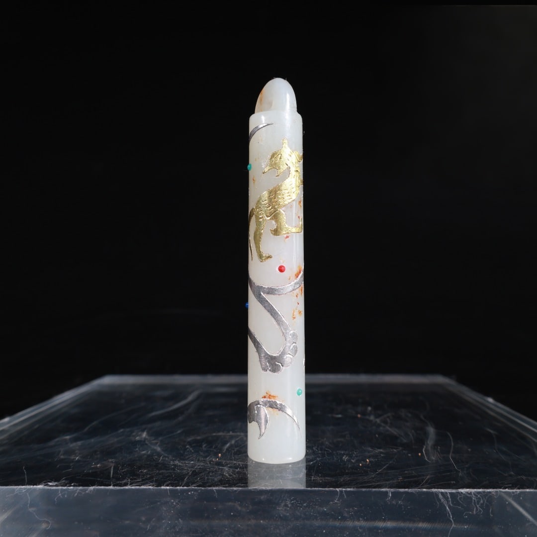 Formerly owned Hetian white jade pendant inlaid with gold and silver, featuring auspicious animal: Formerly owned Hetian white jade pendant inlaid with gold and silver, featuring auspicious animal motifs and gemstones. 83mm high, 13mm wide, weighing 21g. Provenance:Private collection from a profess