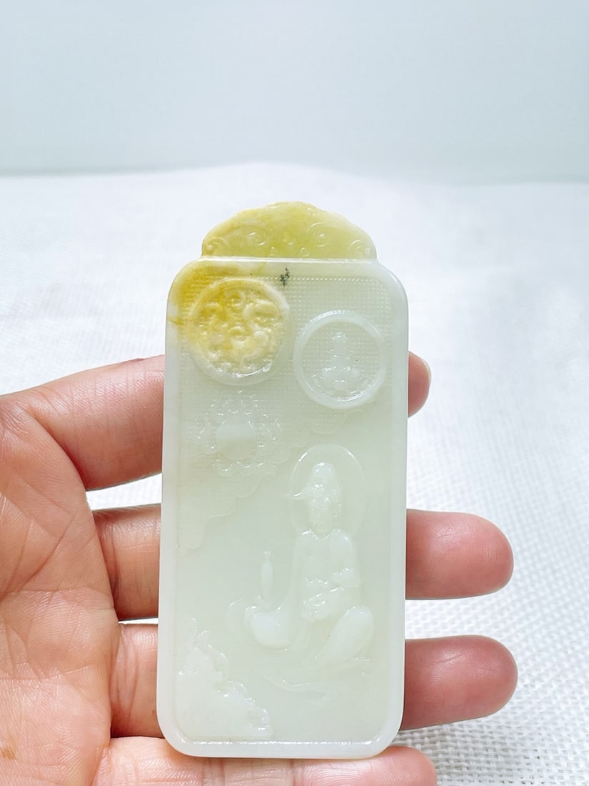Treasured Hetian jade pebble carved Guanyin pendant: This is a rare Hetian jade Guanyin pendant carved from pebble material. Dimensions: 9 x 4 cm, Weight: 91 g Provenance:Private collection from a professor in University College London. We warmly invite