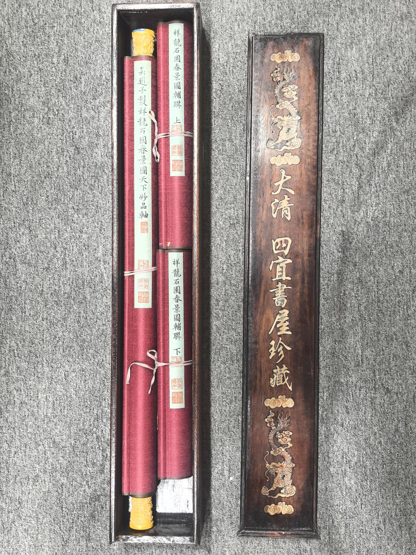 Wu Daozi's Fine Silk Painting: Auspicious Dragon and Rock in Spring: The Daqing Siyi Study Collection features a fine silk scroll painting by Wu Daozi: Auspicious Dragon and Rock in Spring Scenery. The painting itself measures 66 x 134 cm. A single-panel couplet measur