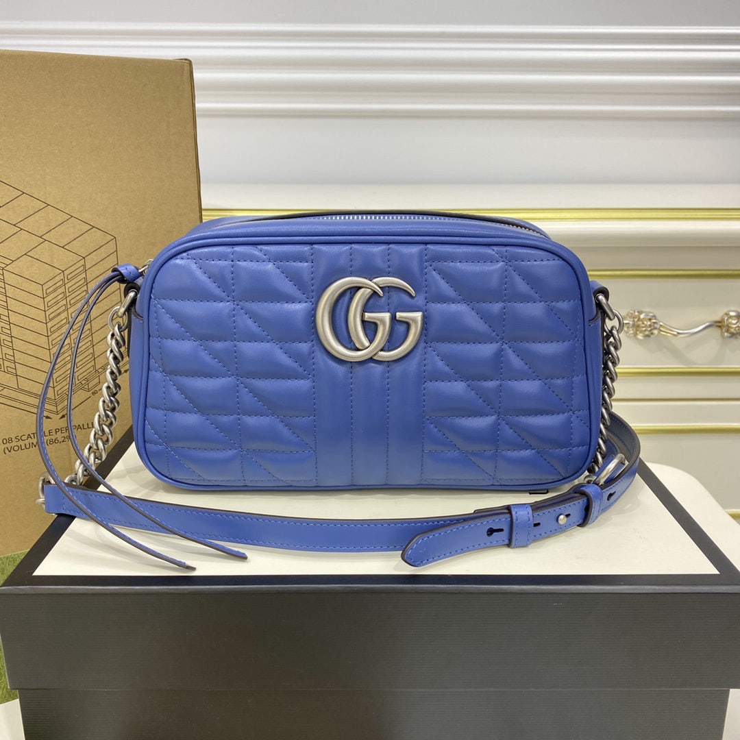 GUCCI MARMONT: We offer FREE SHIPPING for both domestic and international clients who bid over $500. The GUCCI Marmont geometric camera bag in blue is a refreshing take on the classic GUCCI Marmont, featuring striki