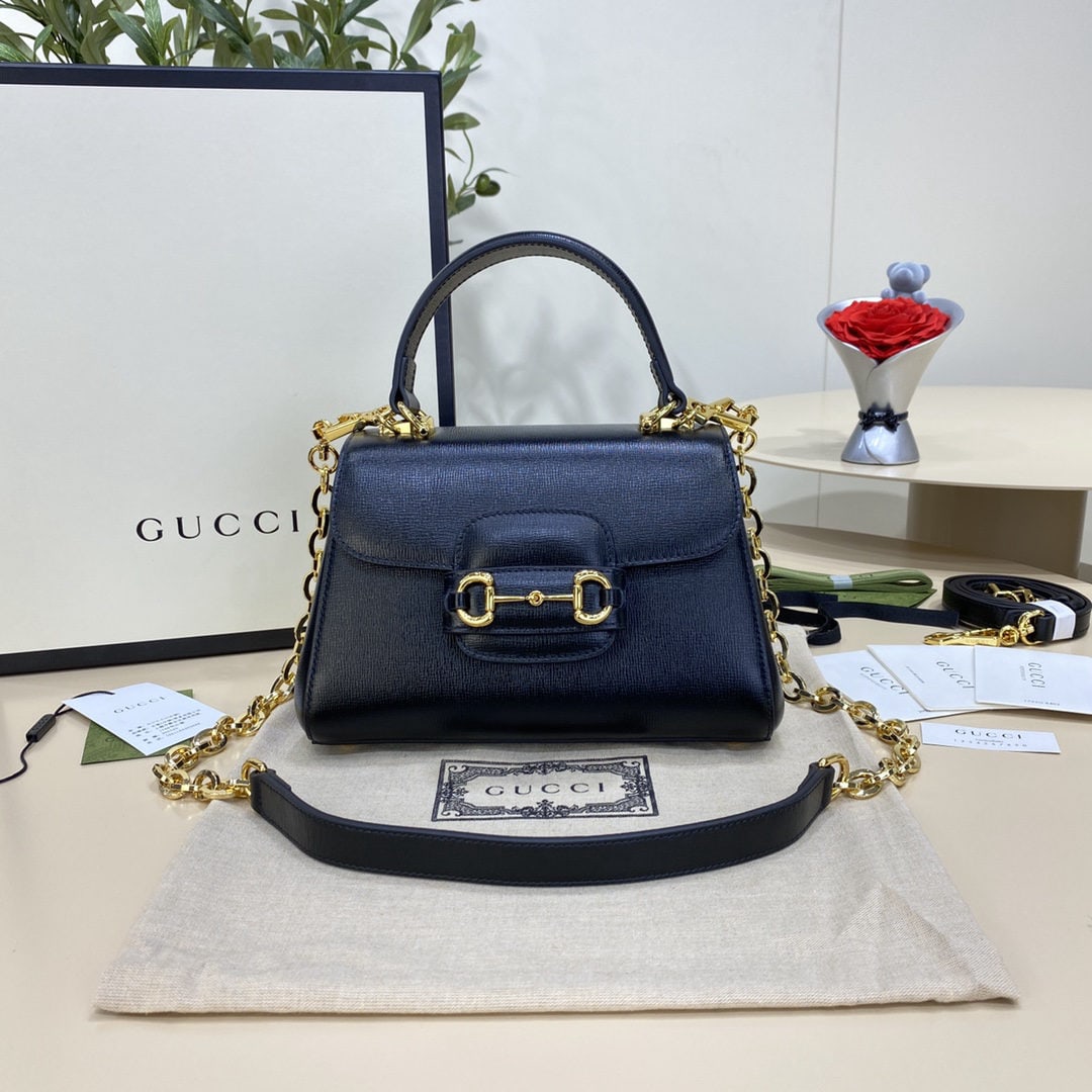 GUCCI Horsebit: We offer FREE SHIPPING for both domestic and international clients who bid over $500. The GUCCI Horsebit 1955 small black tote bag is crafted from black leather. Inspired by the brand's equestrian roo