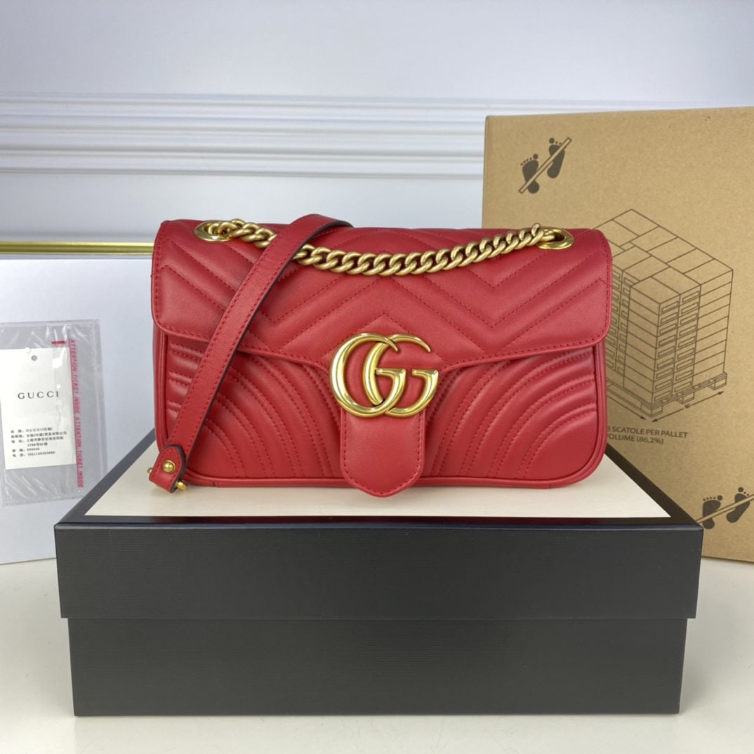 GUCCI MARMONT: We offer FREE SHIPPING for both domestic and international clients who bid over $500. The GUCCI MARMONT medium-sized bag in bright red boasts a structured yet supple shape and an oversized flap closur
