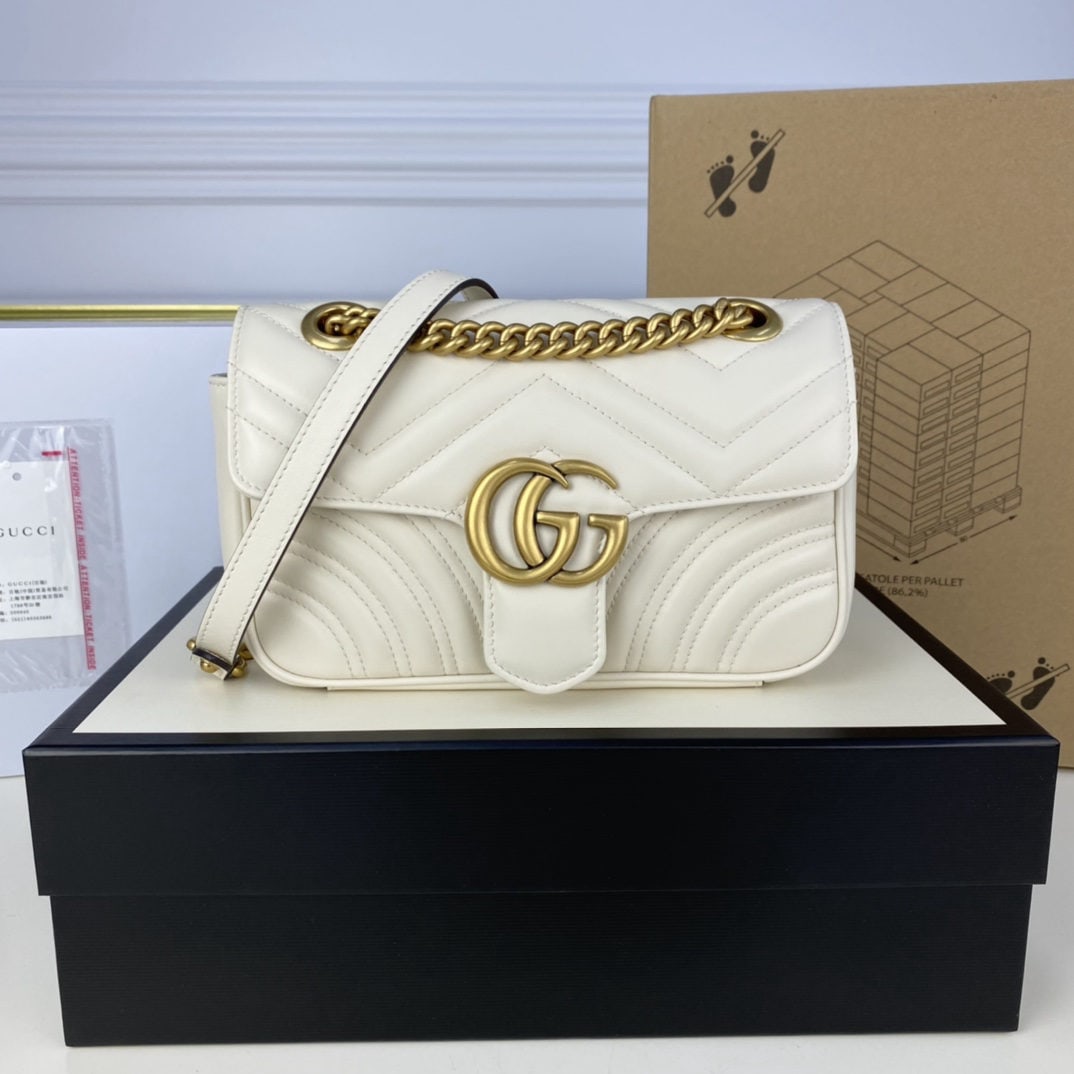 GUCCI Marmont: We offer FREE SHIPPING for both domestic and international clients who bid over $500. The GUCCI Marmont Milkshake White Small boasts a structured yet supple shape and an oversized flap closure. The hi