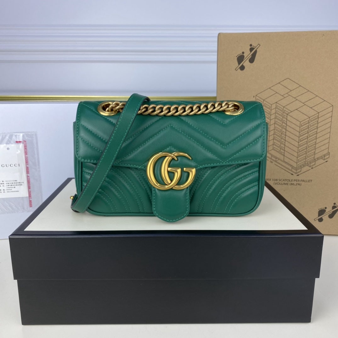 GUCCI MARMONT Emerald Green: We offer FREE SHIPPING for both domestic and international clients who bid over $500. This small GUCCI Marmont emerald green Italian leather bag feels amazing! The leather texture is incredible, makin