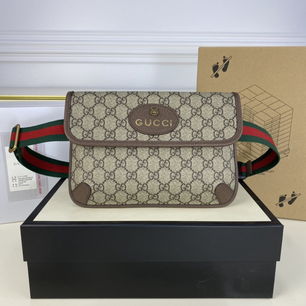 GUCCI Surpreme: We offer FREE SHIPPING for both domestic and international clients who bid over $500. The GUCCI Surpreme canvas tiger head waist bag is crafted from exquisite PVC with a vintage color scheme. It featu