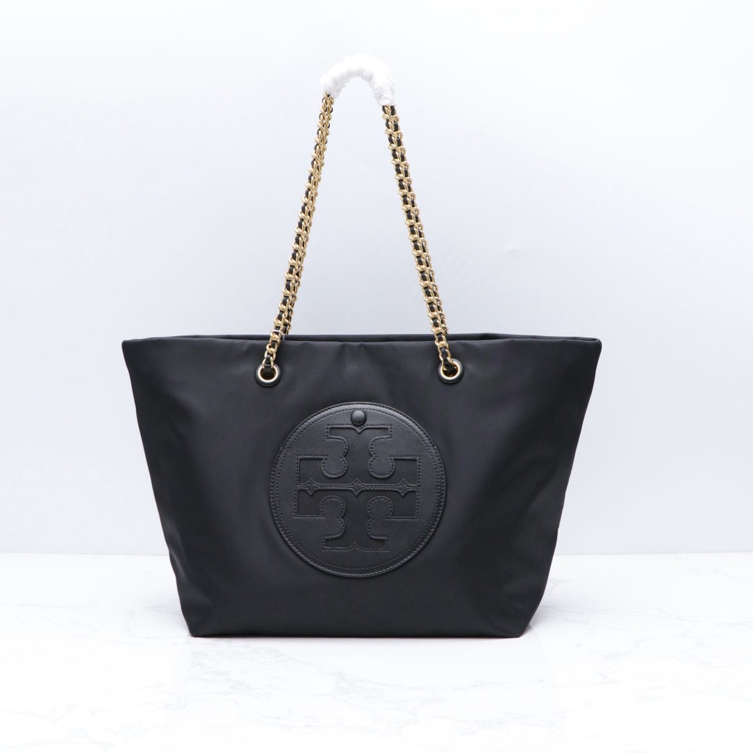 Tory Burch Ella: We offer FREE SHIPPING for both domestic and international clients who bid over $500. The Tory Burch Ella chain tote bag features a soft, deconstructed design, distinguished by its lightweight recycle