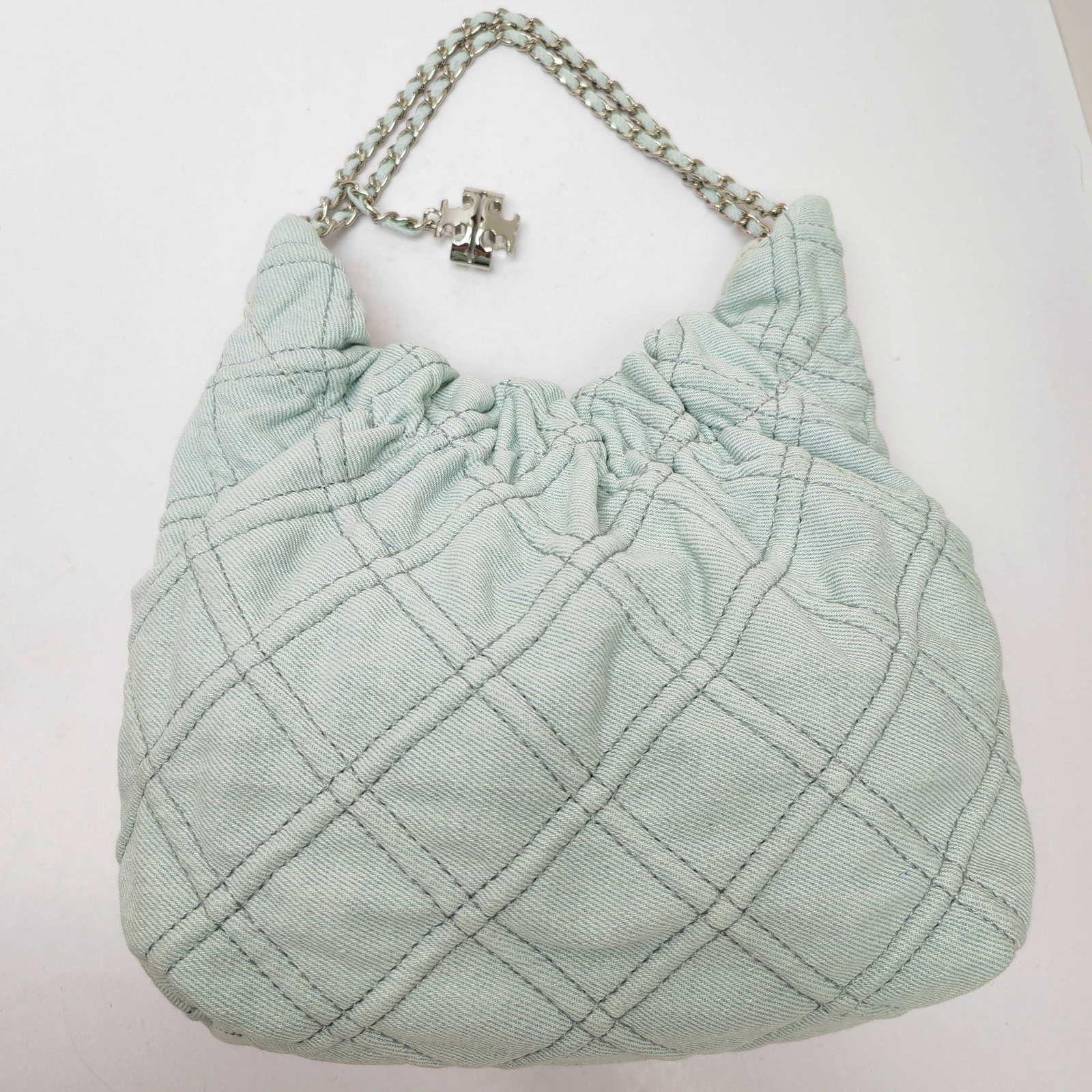 Tory Burch: We offer FREE SHIPPING for both domestic and international clients who bid over $500. Tory Burch's mini lucky bag is now available! It's a denim design, can be worn crossbody or carried by hand, and m