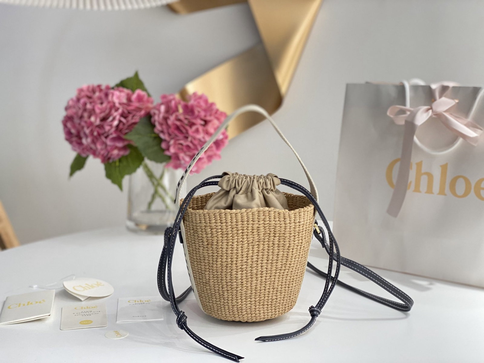 Chloe Small Woody Basket: We offer FREE SHIPPING for both domestic and international clients who bid over $500. The Chloe Spring/Summer 2022 collection features a midnight blue woven wood bag and a Small Woody Basket. The Wood