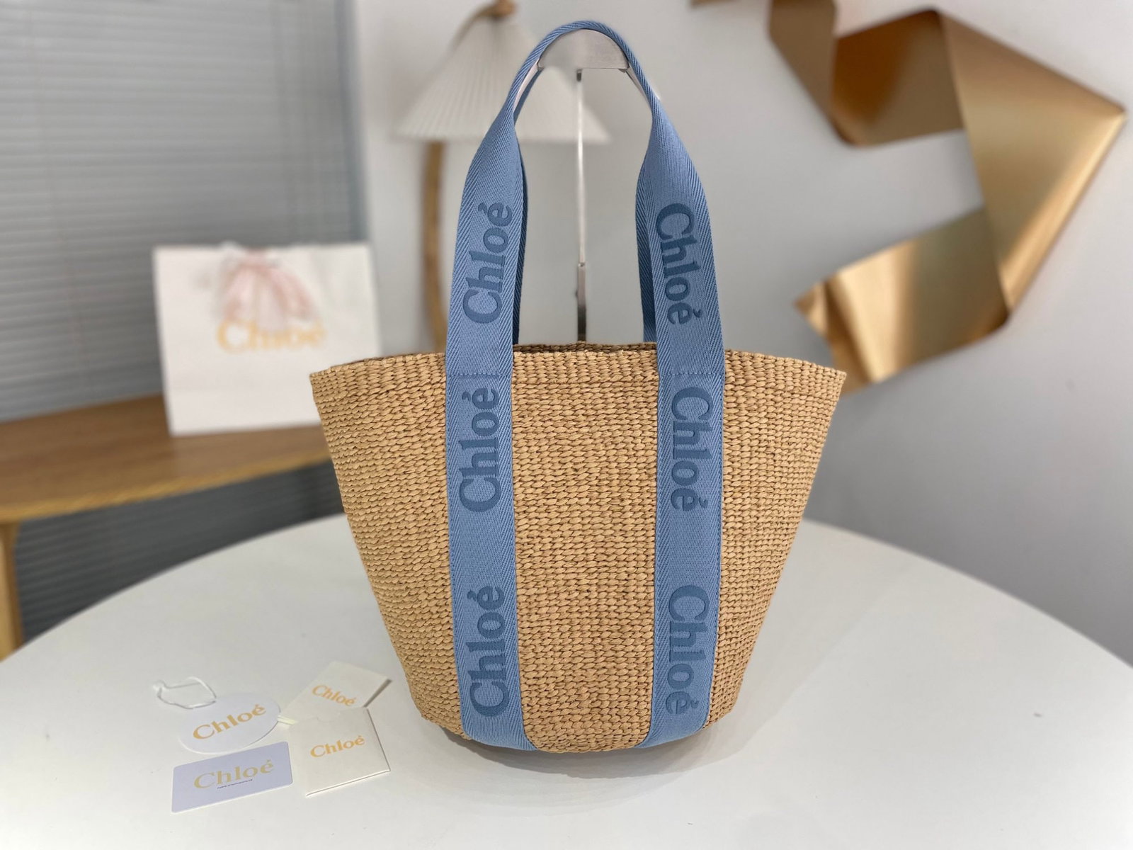 Chloe Woody: We offer FREE SHIPPING for both domestic and international clients who bid over $500. Chloe Woody straw beach bag/bucket bag in blue and pink color blocking. Chloe Woody's most beautiful straw bag fea