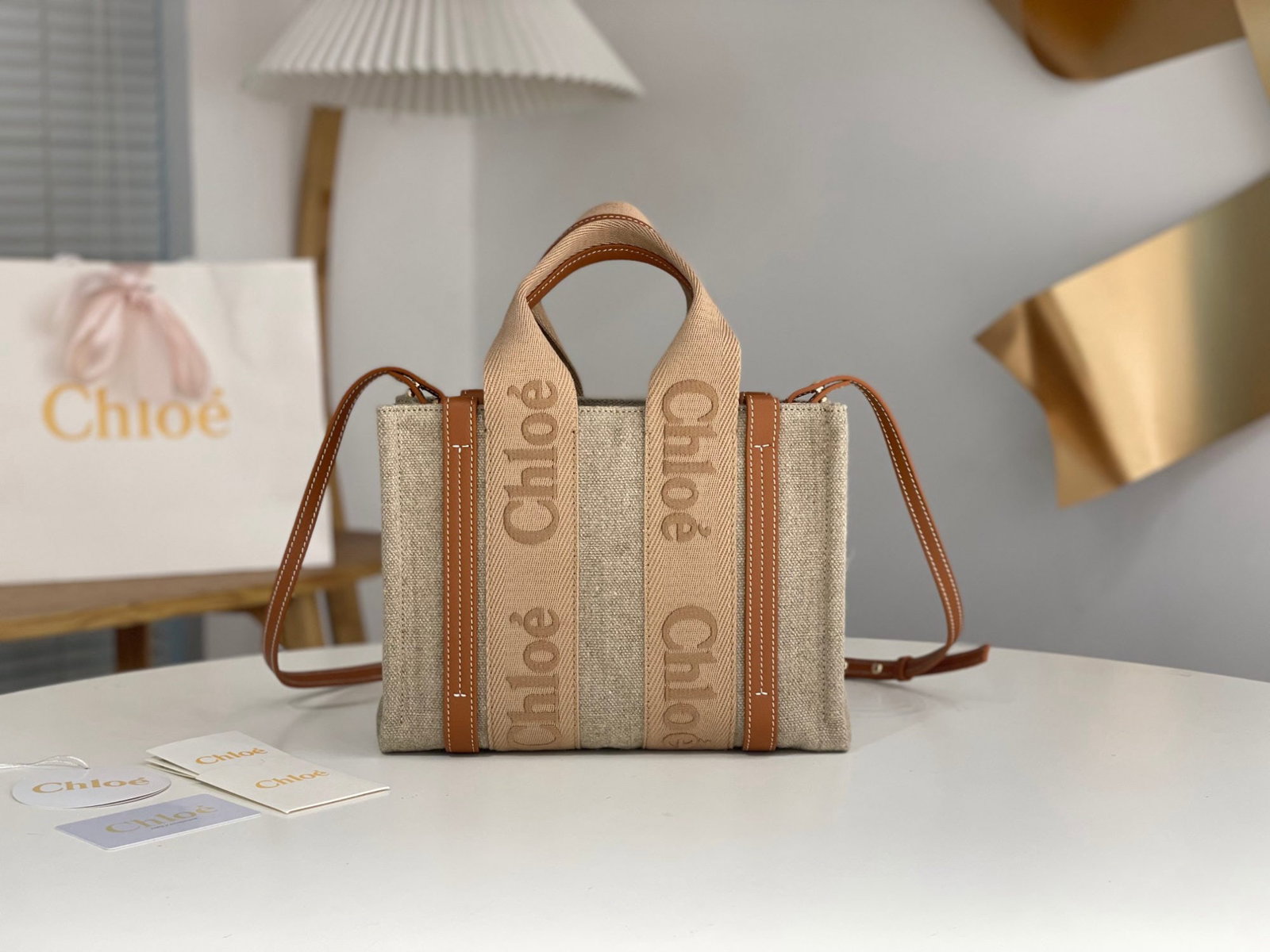 Chloe Woody: We offer FREE SHIPPING for both domestic and international clients who bid over $500. Chloe's Spring/Summer Woody Tote collection is a sweet caramel milk tea color. The ribbon is a pure cotton orange-