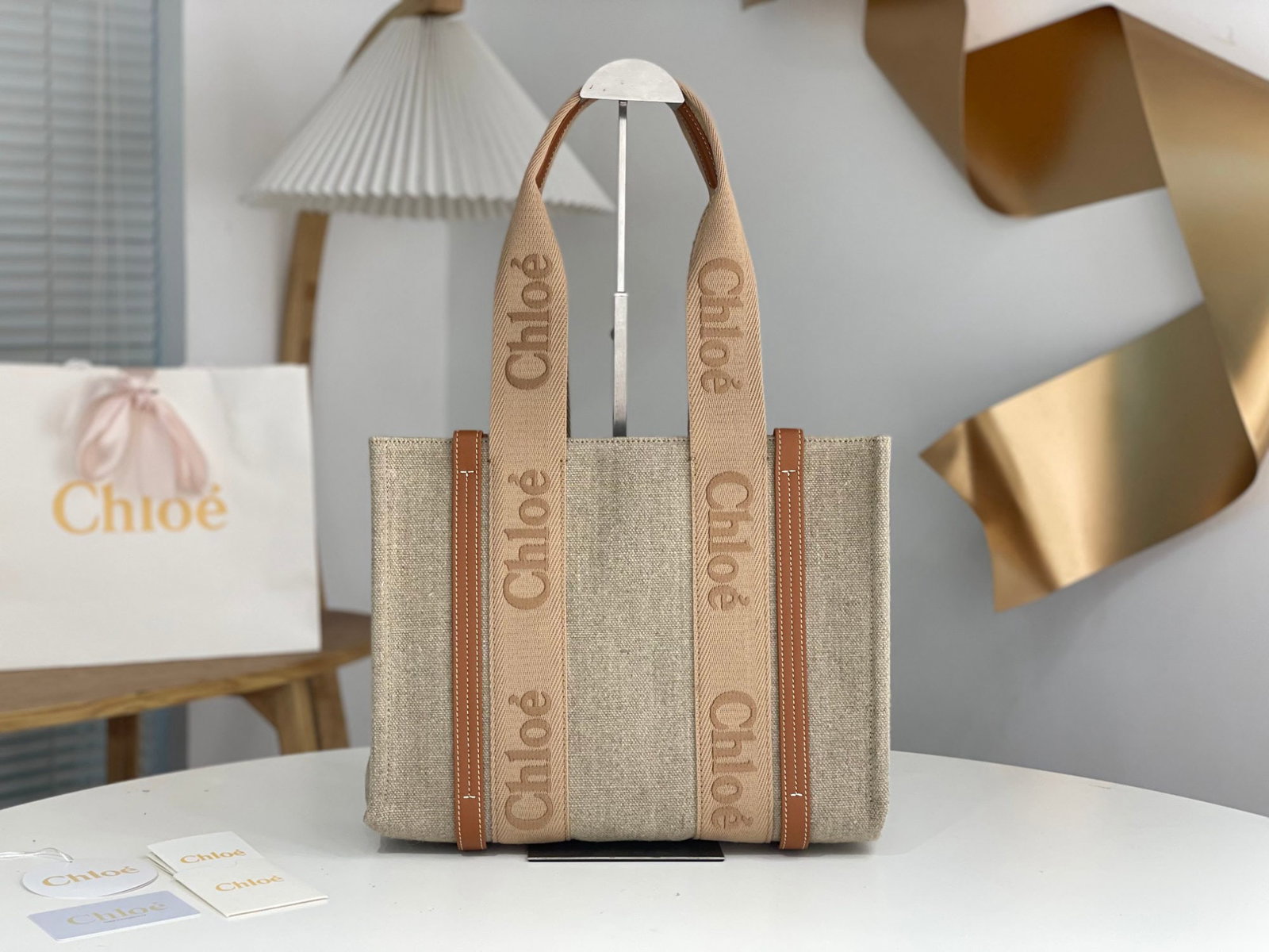 Chloe Woody: We offer FREE SHIPPING for both domestic and international clients who bid over $500. Chloe's Spring/Summer Woody Tote collection is a sweet caramel milk tea color. The ribbon is a pure cotton orange-