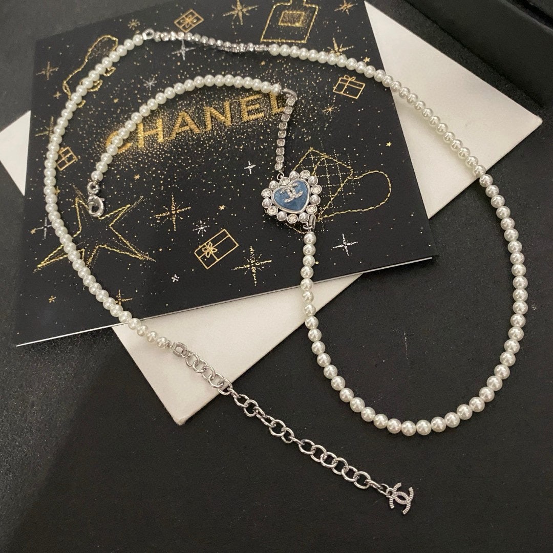 Chanel necklace: We offer FREE SHIPPING for both domestic and international clients who bid over $500. Chanel's medieval lettering necklace A wonderful gift for you or your loved one. Currencies including USD, CAD,