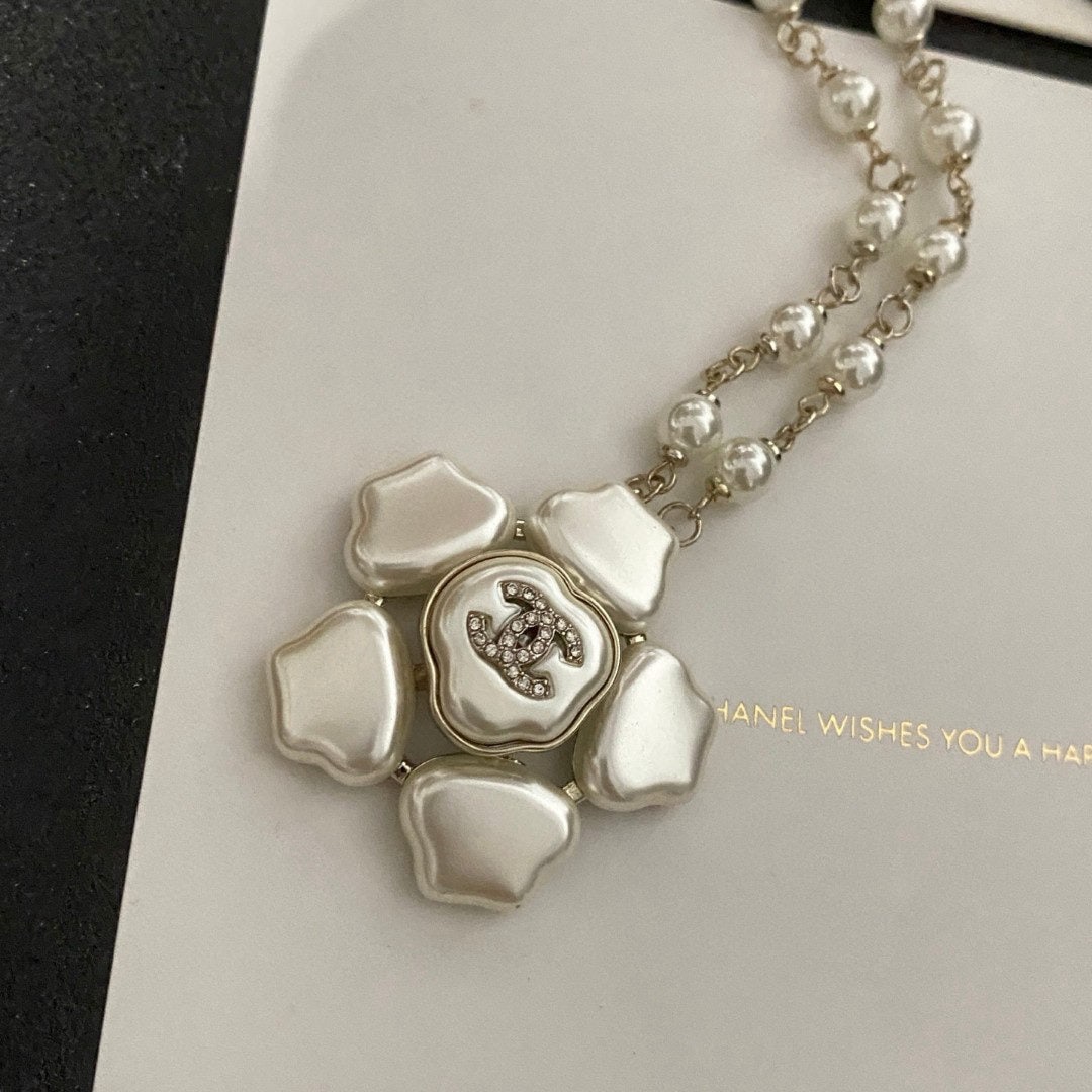 Chanel necklace: We offer FREE SHIPPING for both domestic and international clients who bid over $500. Chanel's medieval lettering necklace A wonderful gift for you or your loved one. Currencies including USD, CAD,