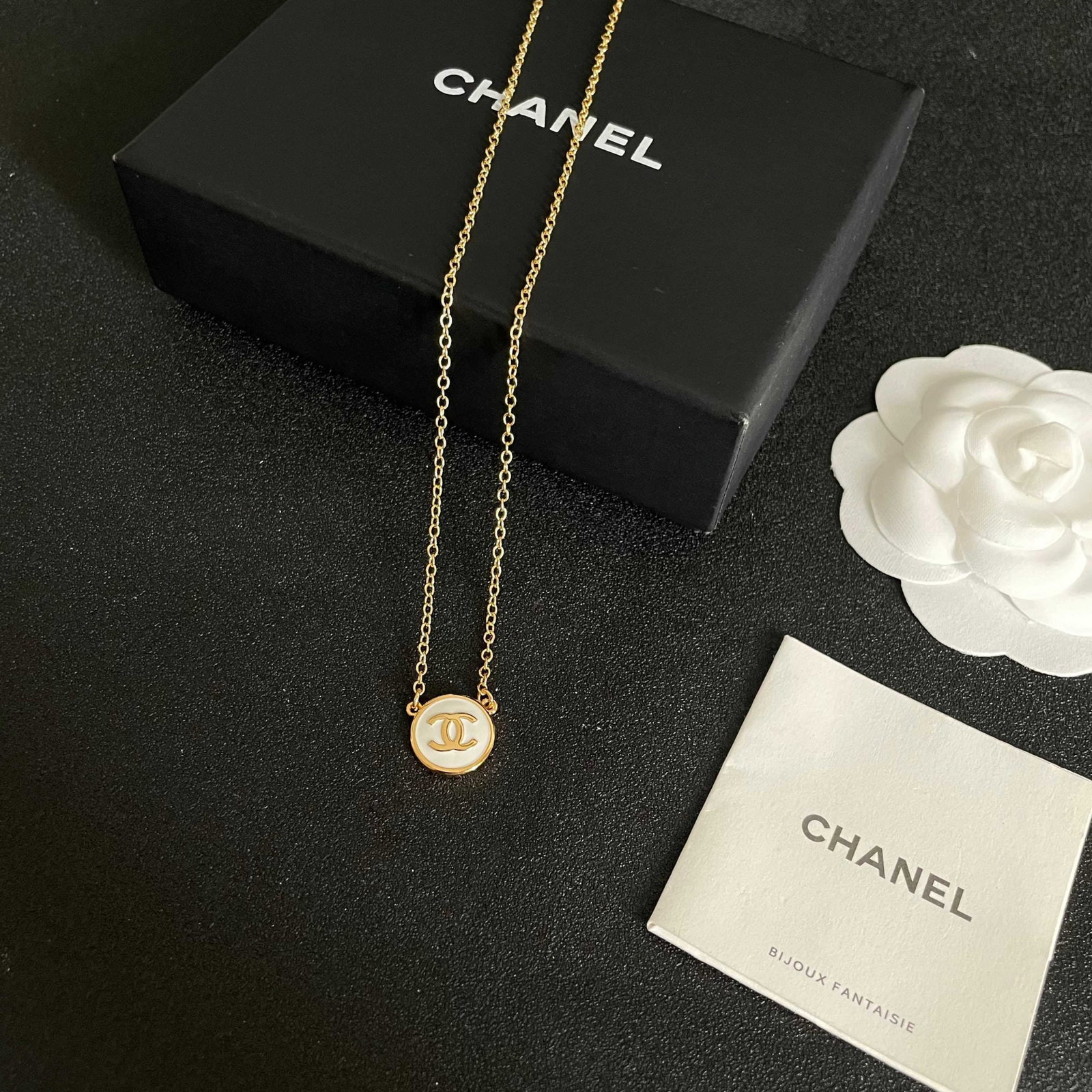 Chanel necklace: We offer FREE SHIPPING for both domestic and international clients who bid over $500. Chanel's medieval lettering necklace A wonderful gift for you or your loved one. Currencies including USD, CAD,