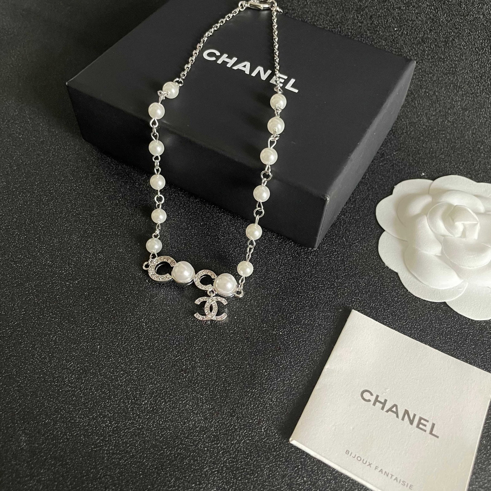 Chanel necklace: We offer FREE SHIPPING for both domestic and international clients who bid over $500. Chanel's medieval lettering necklace A wonderful gift for you or your loved one. Currencies including USD, CAD, GB