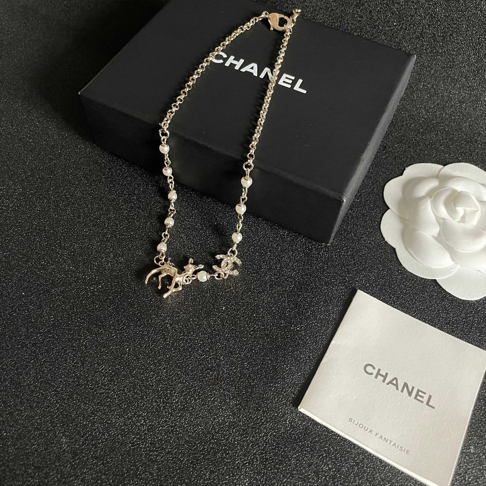 Chanel necklace: We offer FREE SHIPPING for both domestic and international clients who bid over $500. Chanel's medieval lettering necklace A wonderful gift for you or your loved one. Currencies including USD, CAD, GB