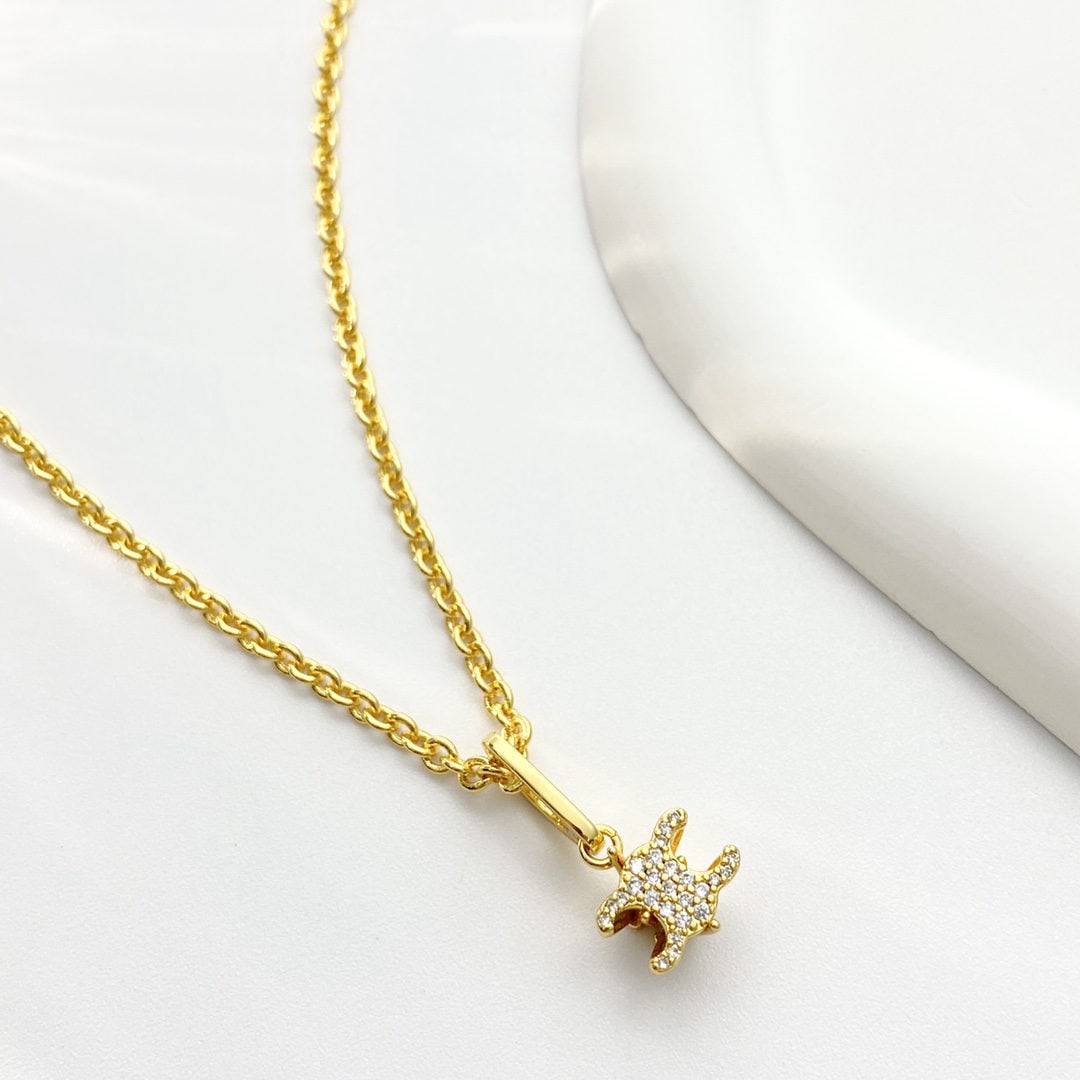 Celine necklace: We offer FREE SHIPPING for both domestic and international clients who bid over $500. Celine's best-selling Arc de Triomphe cupcake-shaped necklace features a delicate and petite Arc de Triomphe emble