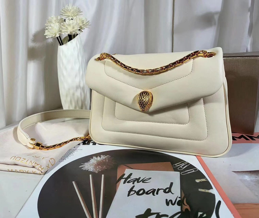 Bvlgari Serpenti Forever: We offer FREE SHIPPING for both domestic and international clients who bid over $500. The Bvlgari SERPENTI REVERSE small shoulder bag reinterprets the classic design with a charmingly voluminous style