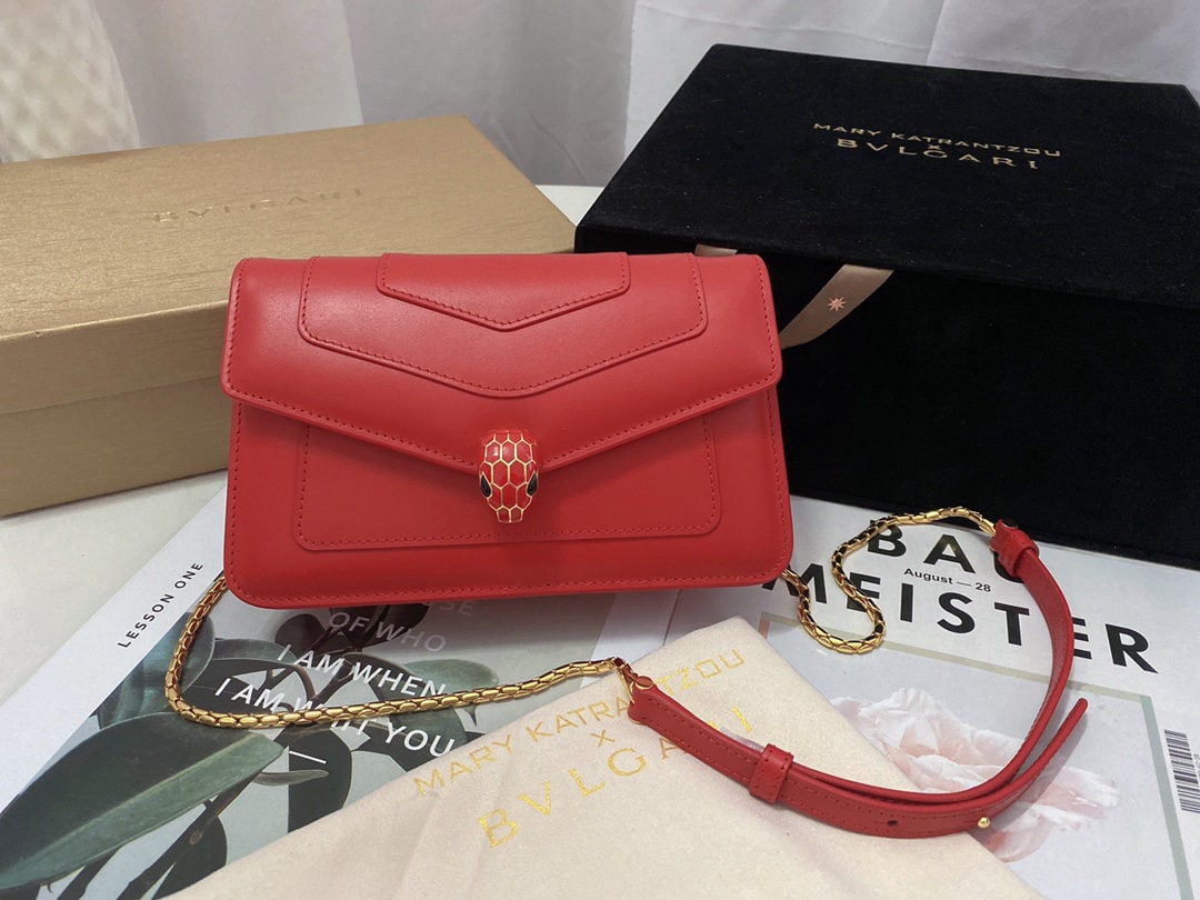 Bvlgari Serpenti Forever: We offer FREE SHIPPING for both domestic and international clients who bid over $500. The Bvlgari SERPENTI FOREVER series chain wallet is crafted from garnet-red calfskin, adorned with matte and gloss