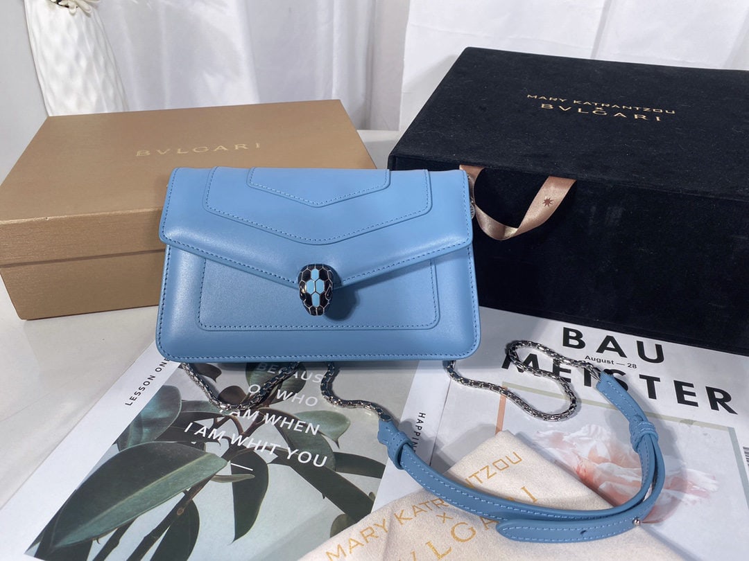 Bvlgari Serpenti Forever: We offer FREE SHIPPING for both domestic and international clients who bid over $500. The Bvlgari SERPENTI FOREVER chain wallet is crafted from Niagara sapphire blue calfskin, adorned with matte and g