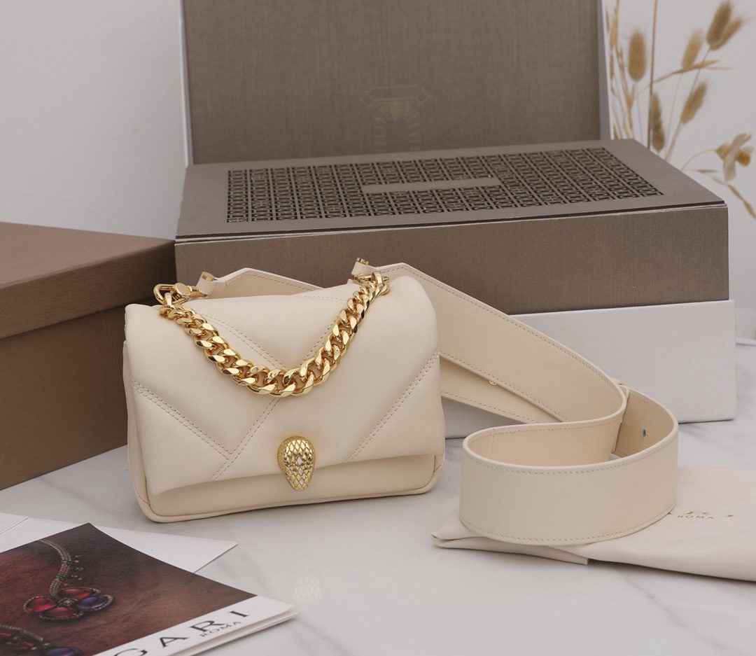 Bvlgari Serpenti Cabochon: We offer FREE SHIPPING for both domestic and international clients who bid over $500. The Bvlgari Serpenti Cabochon mini crossbody bag features a captivating oversized graphic pattern and bold metalli