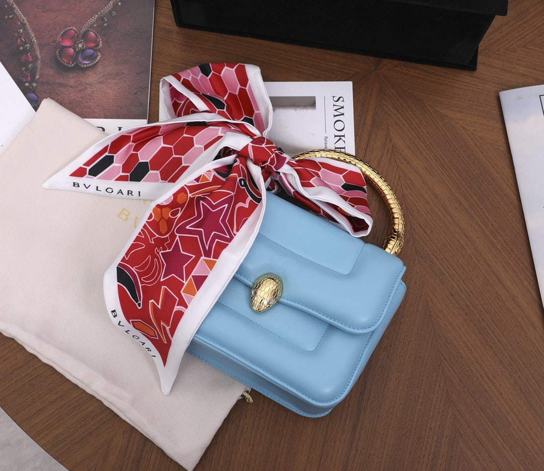 Bvlgari MARY KATRANTZOU: We offer FREE SHIPPING for both domestic and international clients who bid over $500. The Bvlgari MARY KATRANTZOU handbag collection reinterprets the classic Serpenti pattern, drawing inspiration from