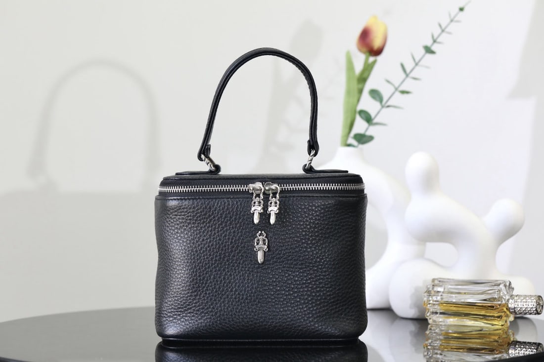 Chrome Hearts: We offer FREE SHIPPING for both domestic and international clients who bid over $500. Chrome Hearts Sugar Sword Handbag (19.5x16x9.5cm) - Made of tumbled leather with silver hardware. Ideal for everyd