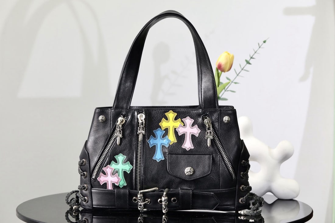 Chrome Hearts ROMRHEARTS JJ dean: We offer FREE SHIPPING for both domestic and international clients who bid over $500. Chrome Hearts RomRHEARTS JJ Dean's motorcycle handbag with a colorful cross design is made of black calfskin with 
