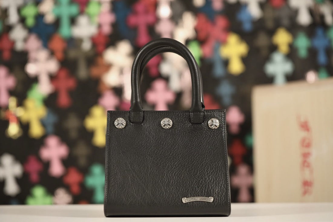Chrome Hearts Drew: We offer FREE SHIPPING for both domestic and international clients who bid over $500. Chrome Hearts Drew Triangle Handbag, crafted from calfskin with silver hardware (6 large cross studs, 1 scroll log