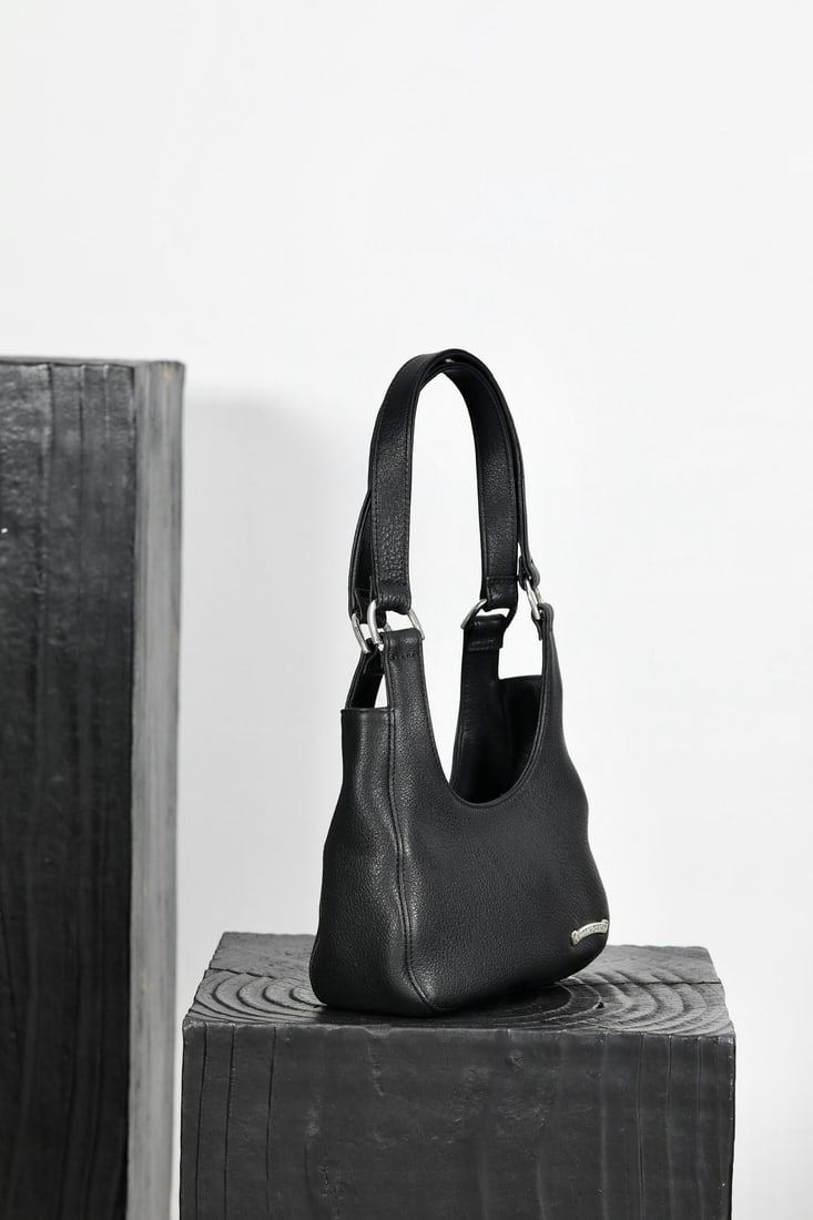 Chrome Hearts HOBO: We offer FREE SHIPPING for both domestic and international clients who bid over $500. Chrome Hearts HOBO Crescent Moon Shoulder Bag. Color: Black ripped cowhide leather, black sword jacquard lining. D