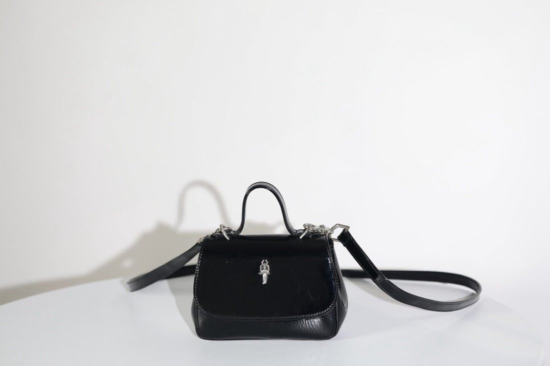 Chrome Hearts Teener: We offer FREE SHIPPING for both domestic and international clients who bid over $500. Chrome Hearts Teener Small Sword Handbag, Crinkled Patent Leather (Approx. 115g Silver Weight), Dimensions: 18.5x1