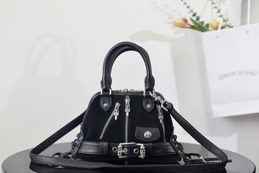 Chrome Hearts Mini modean JJ: We offer FREE SHIPPING for both domestic and international clients who bid over $500. The Chrome Hearts Mini Modean JJ tote bag, also known as the "belt-strap motorcycle shell bag," incorporates a bel