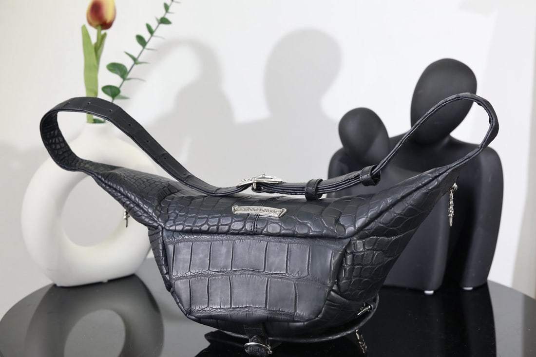 Chrome Hearts Snat Pack Waist Bag/Shoulder Bag in Crocodile Skin: We offer FREE SHIPPING for both domestic and international clients who bid over $500. Chrome Hearts Snat Pack, crocodile leather, classic size: 40cm wide, 15cm high, 9cm thick, strap 2.5cm. Made of Ni