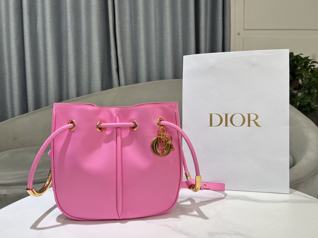 Christian Dior Dior Nolita: We offer FREE SHIPPING for both domestic and international clients who bid over $500. The pink Dior Nolita handbag is from the Fall 2024 ready-to-wear collection, reinterpreting Dior's modern elegance