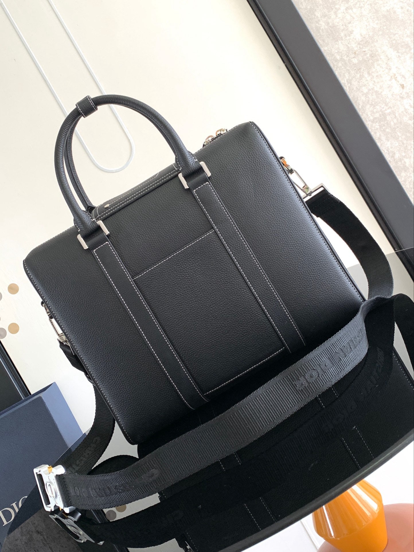 Christian Dior Lingot: We offer FREE SHIPPING for both domestic and international clients who bid over $500. This briefcase, part of the Dior Lingot collection, seamlessly blends classic elegance with Dior's haute couture s
