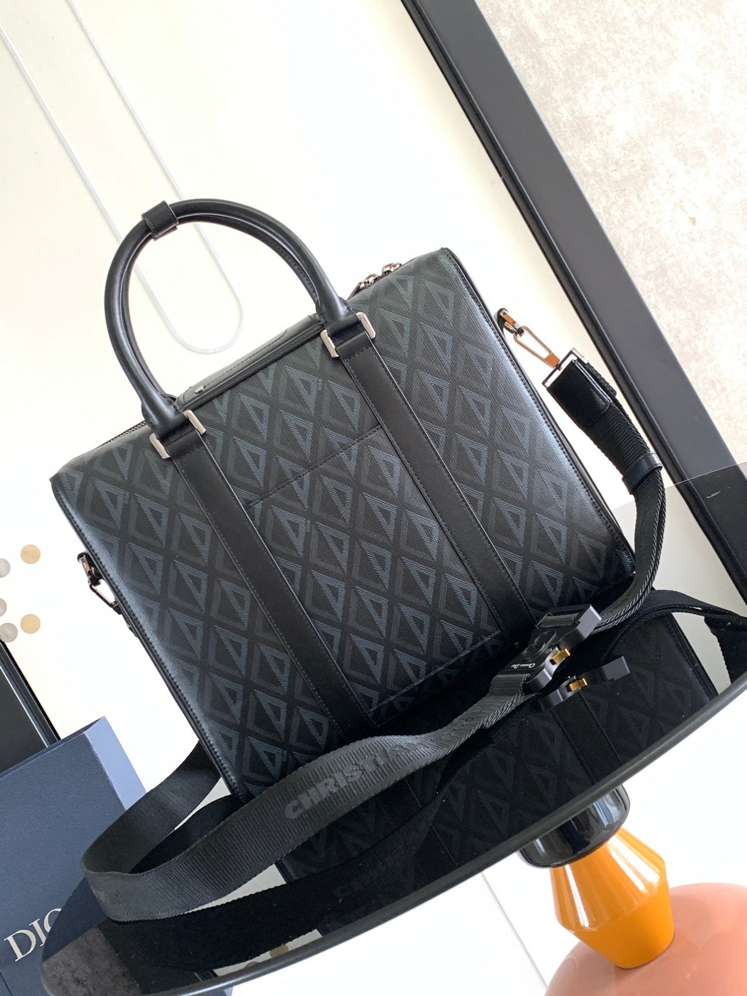 Christian Dior Lingot: We offer FREE SHIPPING for both domestic and international clients who bid over $500. This briefcase, part of the Dior Lingot collection, blends classic elegance with Dior's haute couture spirit. Meti
